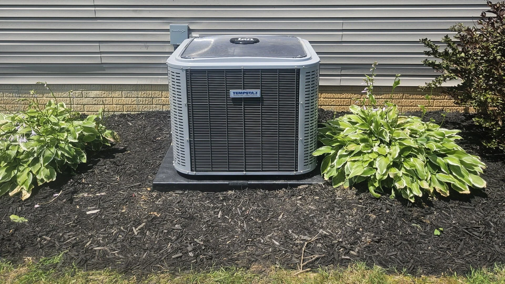 HVAC technician installing heating and cooling equipment