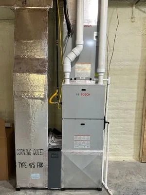 Bosch furnace and tankless water heater installation with insulated ducts and venting
