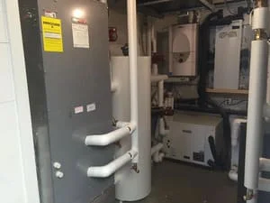 Furnace and HVAC equipment installation with ductwork and refrigerant lines